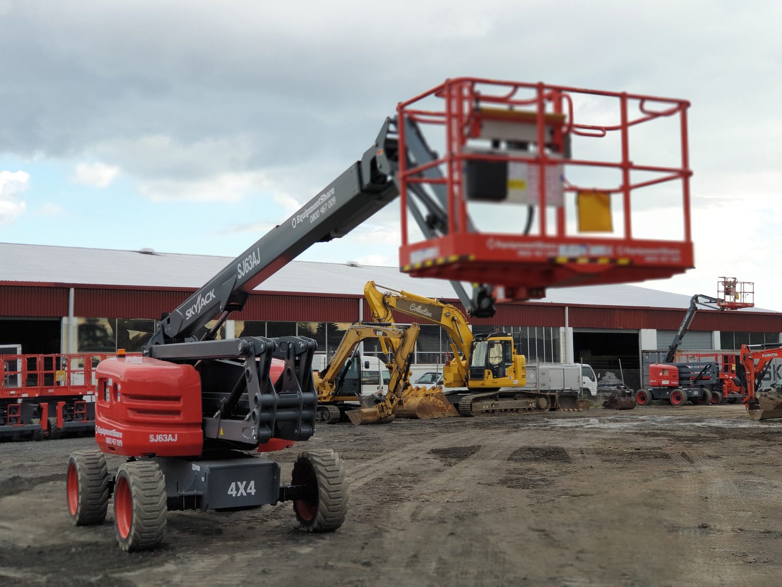 Articulating Boom Lifts working on site